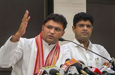 Former Haryana Congress president Ashok Tanwar and Jannayak Janata Party JJP leader Dushyant Chautala during a joint press conference ahead of Haryana Vidhan Sabha elections in New Delhi Wednesday Oct 16 2019. | (Photo | PTI)