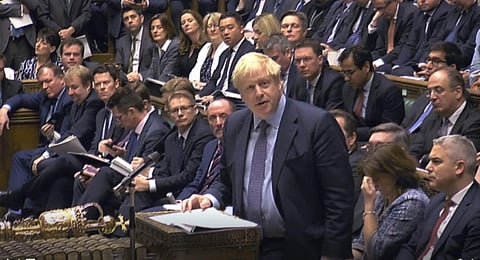 Britain's Prime Minister Boris Johnson delivers a statement to lawmakers inside the House of Commons to update details of his new Brexit deal with EU, in London Saturday Oct. 19, 2019. (Photo | AP)