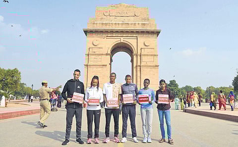 Top runners participating in the Delhi Half Marathon at India Gate in New Delhi on Friday. Tsehay Gemechu is second from left | PARVEEN NEGI