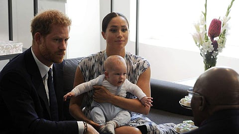 Britain's Prince Harry and Meghan, Duchess of Sussex, holding their son Archie, meet with Anglican Archbishop Emeritus, Desmond Tutu in Cape Town, South Africa. (Photo | File, AP)
