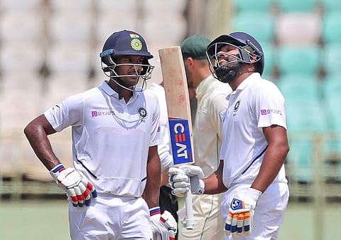 India's Rohit Sharma, right, celebrates after scoring fifty runs with Mayank Agarwal. (Photo | AP)