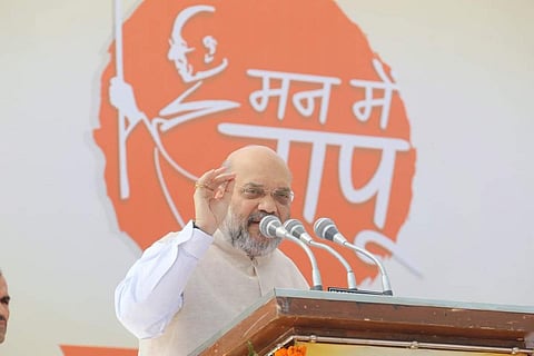 BJP national president and Union Home Minister Amit Shah addresses a rally (Photo| Twitter/@AmitShah)