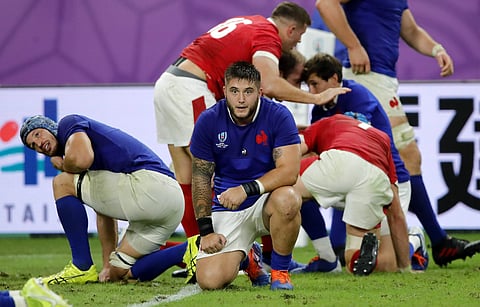 France players react after their Rugby World Cup quarterfinal loss to Wales at Oita Stadium in Oita. (Photo | AP)