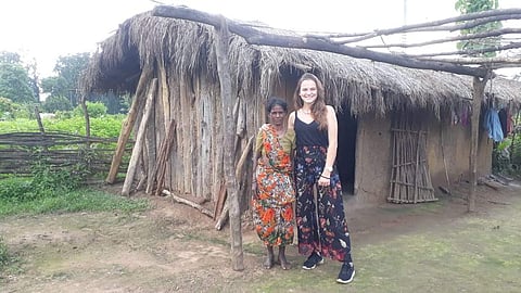 Poland tourist Marika Drobnik at Jabarra doing Yoga and with primitive tribe woman.