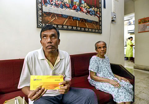 Allwyn Dsouza, one of the depositors of the crisis-hit PMC bank, is dependent on the interest received to look after himself and his 85 year old mother Tresea R. (Photo | PTI)