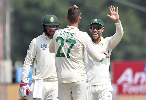 South Africa's captain Faf du Plessis, right, celebrates with teammates George Linde, center, and wicketkeeper Heinrich Klaasen. (Photo | AP)