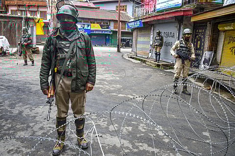 Security personnel stand guard during restrictions in Srinagar (File Photo| PTI)