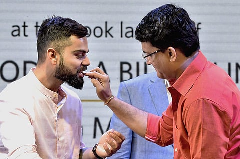 Indian cricket captain Virat Kohli (L) with Sourav Ganguly. (Photo| PTI)