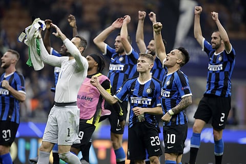 Inter Milan players celebrate the win. (Photo | AP)