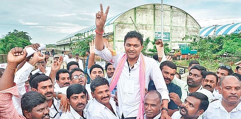 TRS candidate S Saidi Reddy celebrates with the party workers after his victory in Huzurnagar on Thursday