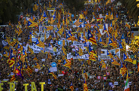 Catalan pro-independence protesters march during a demonstration in Barcelona, Spain. (Photo | AP)
