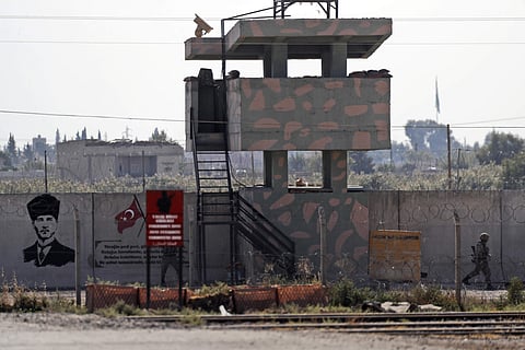 A Turkish soldier mans an outpost at the border with Syria in Akcakale, southeastern Turkey. (Photo | AP)