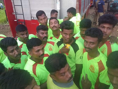 The 12 firemen who have been selected for going down the hole being drilled adjacent to the borewell in which Sujith is stuck. (Photo | EPS)