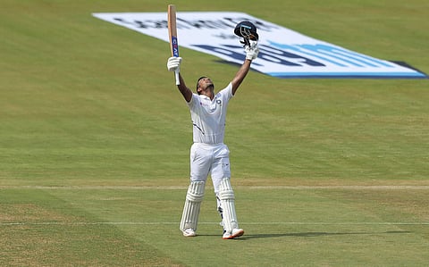 Mayank Agarwal raises his bat after scoring his double hundred (Photo | AP)