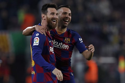 Barcelona's Lionel Messi celebrates his goal with Barcelona's Jordi Alba. (Photo | AP)