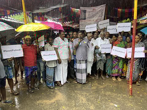 Fishermen protest against the proposed expansion of Adani port in Pulicat on Wednesday | Express