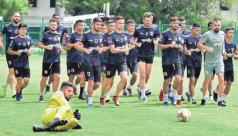 Chennaiyin FC players during a practice session in Chennai on Tuesday. The two-time champs are yet to score in two matches so far this season | D SAMPATHKUMAR