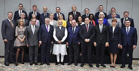 In this photo released by government of India, India Prime Minister Narendra Modi, front row in white dress, poses with a delegation of European Parliament members who called on him in New Delhi, India, Monday, Oct.28, 2019. (Photo | AP, Government of Ind