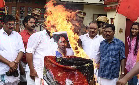 KSYF youth wing of CMP activists burning the effigy of State Women's Commission Chairperson M C Josephine in protest against the apathy of Women's Commission in intervening the Walayar case in Thiruvananthapuram on October 30. (Photo | BP Deepu)
