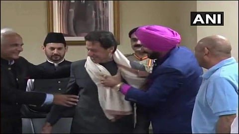 Congress leader Navjot Singh Sidhu with Pakistan Prime Minister Imran Khan. (Photo | File, ANI Twitter)