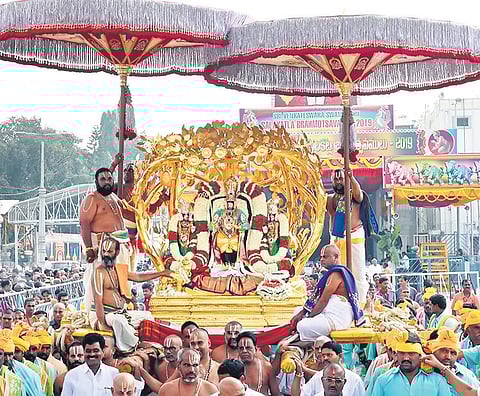 The idols of Lord Malayappa Swamy and His two consorts Sridevi and Bhudevi taken in a procession on ‘Kalpavriksha Vahanam’ at Tirumala on Thursday | madhav K