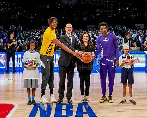 Reliance Foundation Nita Ambani presents the ceremonial ''Match Ball'' to NBA officials ahead of the first-ever NBA game between Indiana Pacers vs Sacramento Kings. (Photo | PTI)