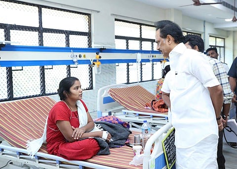 Stalin interacts with a dengue patient at Rajiv Gandhi Government Hospital on Sunday (Photo | Facebook/@MKStalin)