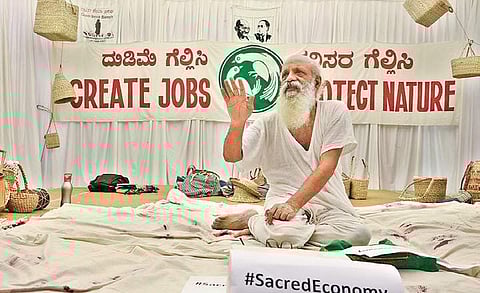 Theatre director and activist Prasanna takes part in ‘Hunger Sathyagraha’ at Gandhi Bhavan premises in Bengaluru on Sunday | Shriram BN