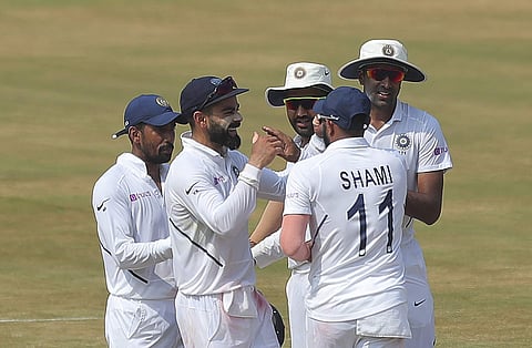 India skipper Virat Kohli celebrates with teammates. (Photo | AP)
