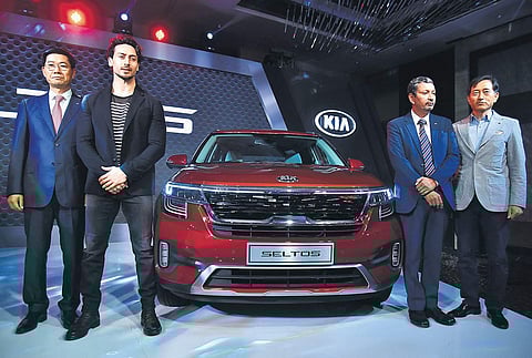 Kia MD & CEO Kookhyun Shim and Bollywood actor Tiger Shroff at the launch of Kia Seltos in New Delhi.