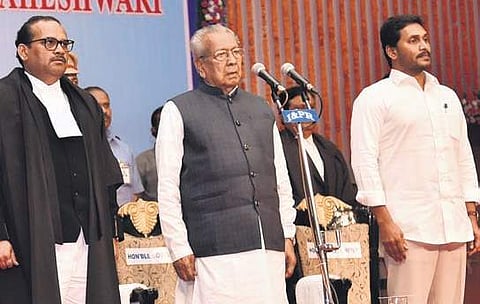 Justice Jitendra Kumar Maheshwari, Governor Biswabhusan Harichandan and Chief Minister YS Jagan Mohan Reddy in Vijayawada on Monday | Express
