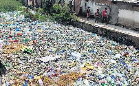 large pile of plastics blocking a canal at Chintalabasti in Hyderabad (File Photo |EPS)