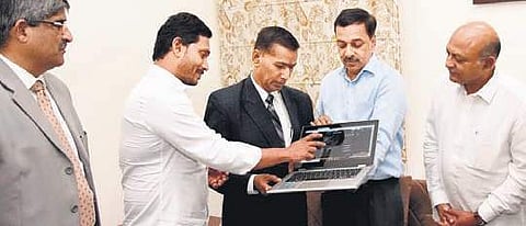 CM Jagan Mohan Reddy, along with judicial preview panel chairman Justice B Siva Shankara Rao, launching the official logo of the committee on Monday | Express