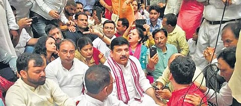 Sanjay Singh and AAP workers protest over Chhath Puja ghats construction. (Photo | Twitter)