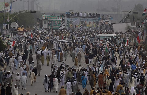 Supporters of a Pakistani radical Islamist party, Jamiat Ulema-e-Islam, attend an anti-government march, in Islamabad, Pakistan on 1 November 2019. (Photo | AP)
