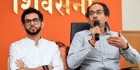 Shiv Sena party Chief Uddhav Thackeray with his son Aaditya Thackeray (Photo | PTI)