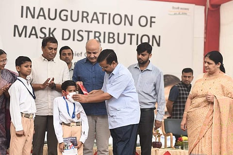 Delhi CM Arvind Kejriwal along with dyCM Manish Sisodia during an event to distribute free masks in Delhi Government Schools at Rajkiya Pratibha Vikas Vidyalaya Civil Line in New Delhi on Friday (Express Photo by Parveen Negi)