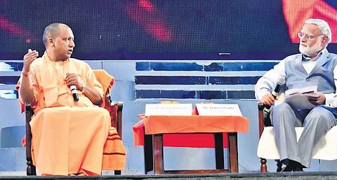 Uttar Pradesh Chief Minister Yogi Adityanath with The New Indian Express Group Editorial Director Prabhu Chawla (Photo | EPS)