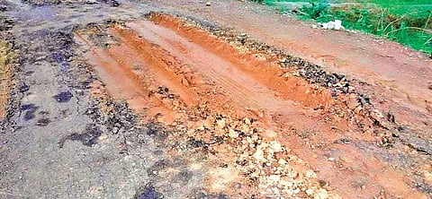 A portion of damaged road built with CTB technology in the district