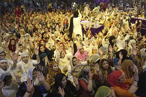 Sikh devotees take part in a celebrations of the 550th birth anniversary of Sikhism's founder, Guru Nanak Dev. (Photo | AP)