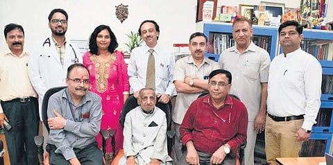 The doctors who performed the surgery, with the patient. (Photo | EPS)