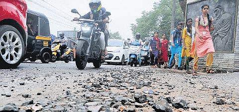 The dilapidated stretch between IMG Junction and Infopark main gate. Commuters have a tough time navigating the stretch| A Sanesh