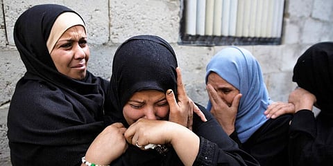 Relatives of Islamic Jihad militant, Abdullah Al-Belbesi, 26, who was killed in Israeli airstrikes, mourn his death in the family home, during his funeral in the town of Beit Lahiya, Northern Gaza Strip, Wednesday, Nov. 13, 2019. (Photo | AP)
