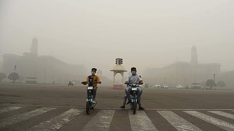 Children wear mask to protect themselves from pollution as a the air quality dips to ‘very poor’ category, in New Delhi