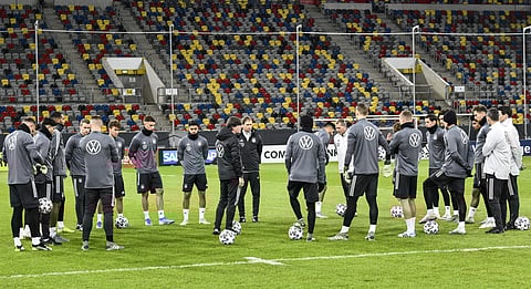 Germany's head coach Joachim Loew, center, talks to his team during a training session of Germany's national team in Duesseldorf, Germany, Wednesday, Nov. 13, 2019. | (Photo | AP)