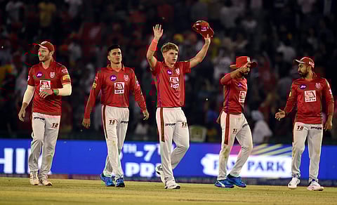 Sam Curran celebrates with KXIP teammates. (Photo | PTI)