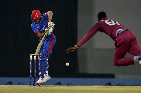 Afghanistan's batsman Rahmanullah Gurbaz looks back after playing a shot during the third T20 international cricket match of a three-match series between Afghanistan and West Indies at Ekana Cricket Stadium in Lucknow. (Photo | AFP)