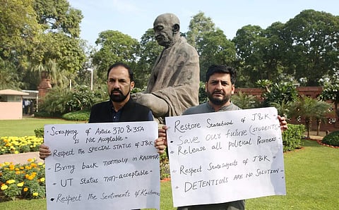 PDP MPs Nazir Ahmad Laway and Mir Fayaz protesting outside the Parliament. (Photo | Shekhar Yadav, EPS)