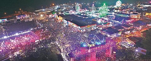 Aerial view of the illuminated Baliyatra trade fair on the banks of river Mahanadi in Cuttack on Friday. (Photo | EPS)