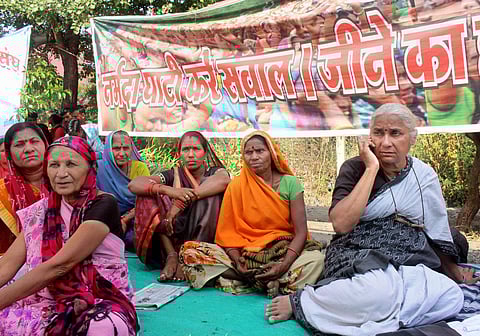 Social activist Medha Patkar along with villagers and dam oustees of Sardar Sarovar dam from Nimad region of Madhya Pradesh protests on the second consecutive day in front of Narmada Valley Development Authority office in Bhopal Sunday Nov. 17 2019. | (Ph